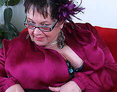 Huge breasted British mature BBW playing all by herself