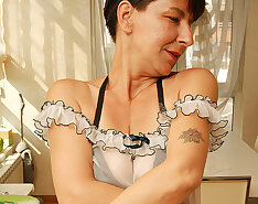 Naughty housewife getting hot during her work
