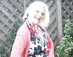 Naughty British housewife playing in the garden