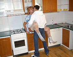Horny housewife fucking in her kitchen